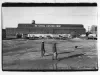 Print, Photographic - Workers Behind Re-Steel Center Corporation, Facing North