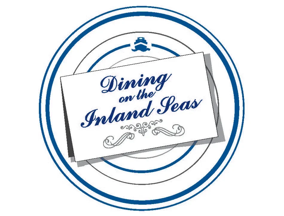 Dining on the Inland Seas logo with blue circular design and a ship icon.