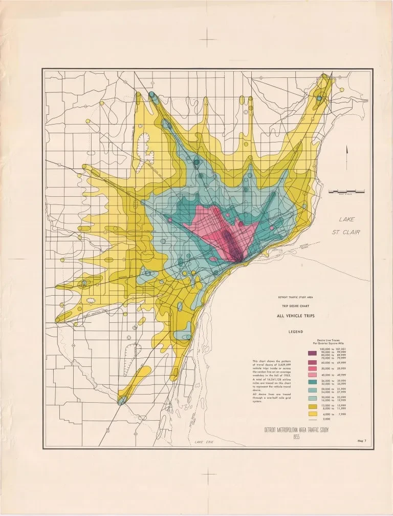 Colorful map of Detroit depicting areas of different population densities in pink, blue, and yellow.