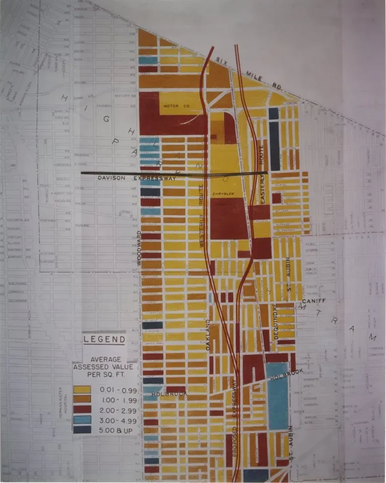 Color-coded map showing residential zones with various red, yellow, and blue sections.